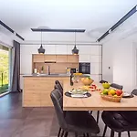 Cvita Is A Modern 5-bedroom With A Jacuzzi, A Gym And Finnish Sauna, A Heated Pool, And Amazing Views