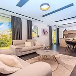 Villa Cvita Is A Modern 5-bedroom With A Jacuzzi, A Gym And Finnish Sauna, A Heated Pool, And Amazing Views